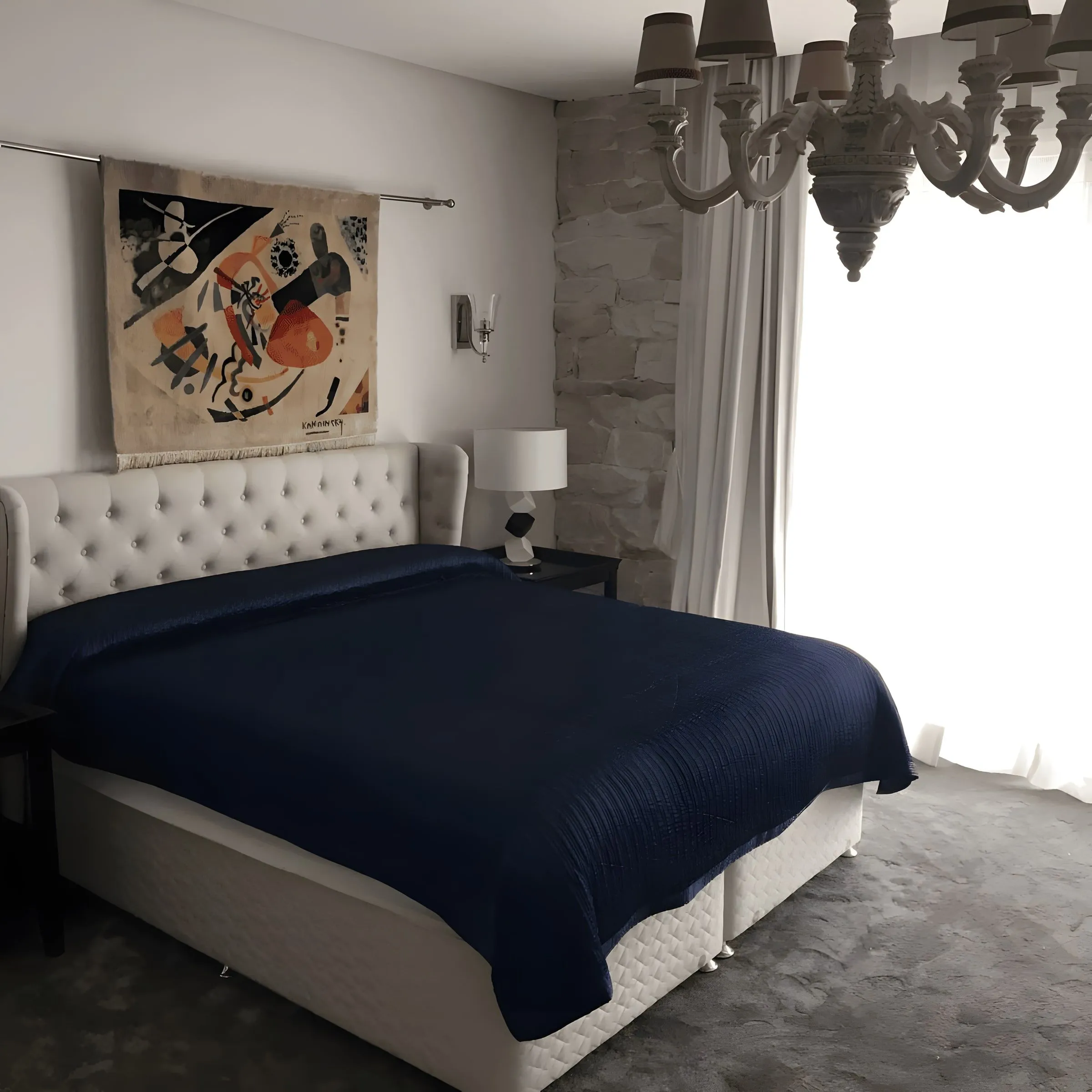 Bedroom with buttoned headboard