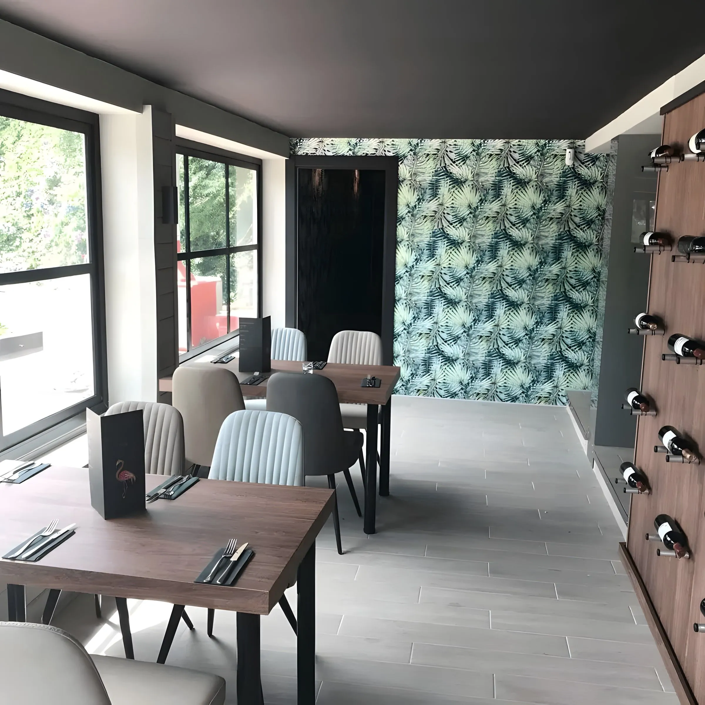 Indoor terrace with tropical wallpaper