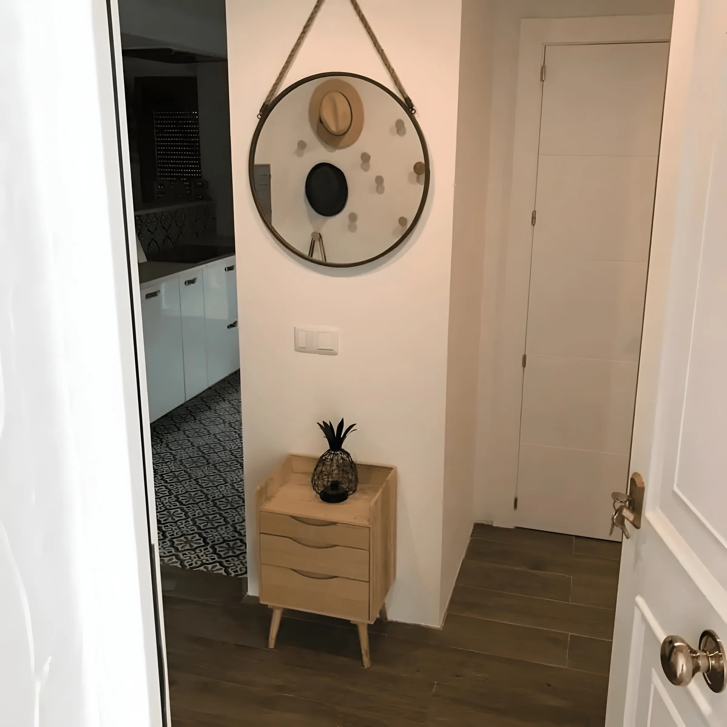 Hallway with round mirror